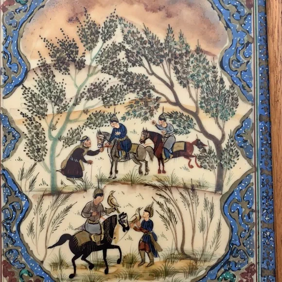 Hand painted on ivory? I am not an expert!! This is a very beautiful .